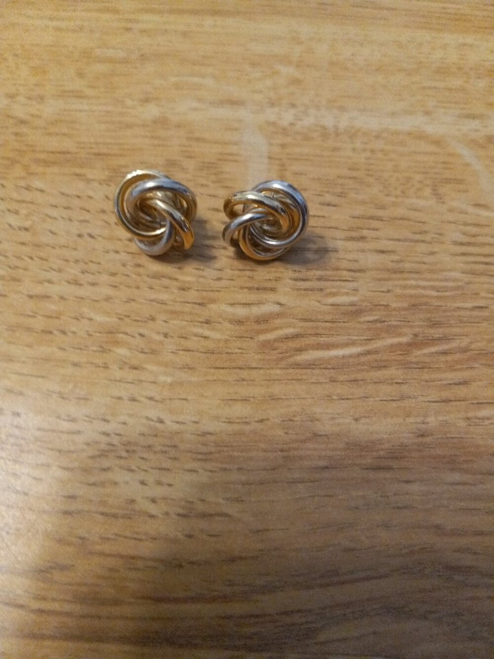 MARKED on Closures 585  14K TWO COLOR GOLD SWIRL PIERCED EARRINGS  Weights 3.4 g